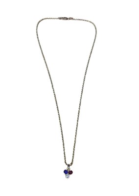 Lot 16 - Victorian diamond ruby and blue sapphire pendant in the form of a spade, on a modern 9ct gold chain