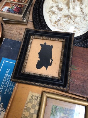 Lot 33 - Sundry items, including a group of silver plate, an enamelled dressing table set, a framed scene of the crucifixion in relief, board games, a Georgian silhouette, etc