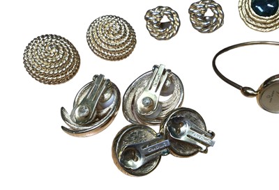 Lot 27 - Five pairs of 1980s gilt metal clip on earrings to include two pairs of Christian Dior simulated pearl earrings, two pairs by Monet and one pair by Leritz, together with a Michel Herbelin gold plat...