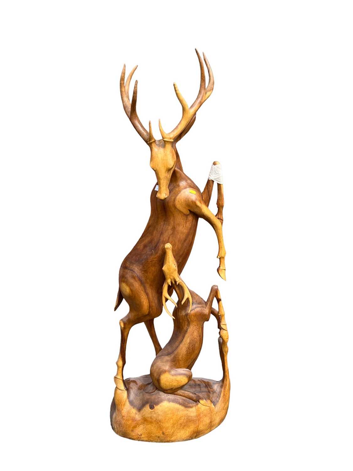 Lot 7 - Hardwood carving of two deer, 158cm high