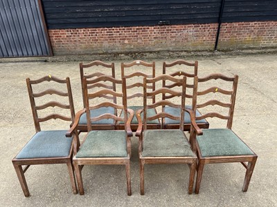 Lot 17 - Set of seven early 20th century lined oak ladder back chairs, with two carvers