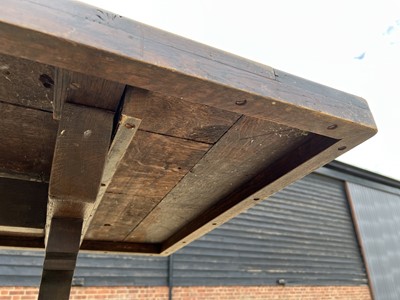 Lot 18 - Early 20th century oak refectory table, with plank top on trestle ends, 163 x 79cm