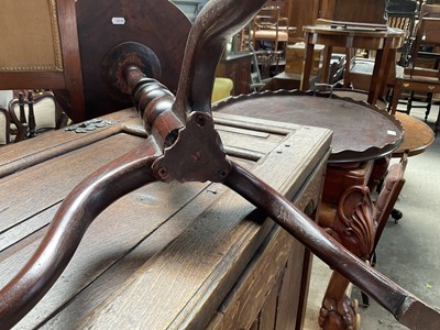 Lot 21 - Antique mahogany wine table, with dished top on tripod base, 34cm diameter