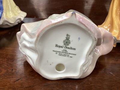 Lot 1198 - Ten Royal Doulton figures - Beat You To It HN2871, Christine HN2792, Antonia HN4674, Special Wishes HN4749, Elaine HN4718, Lisa HN2394, Joanna HN4711, Ninette HN4717, Pensive Moments HN2704 and Sec...