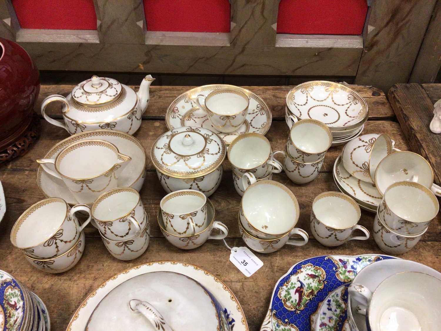 Lot 35 - 19th century Crown Derby tea set decorated with gilt swags