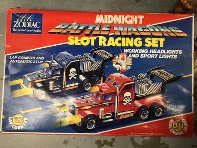 Lot 46 - Two 1980's slot car sets together with a scalextric set (3)