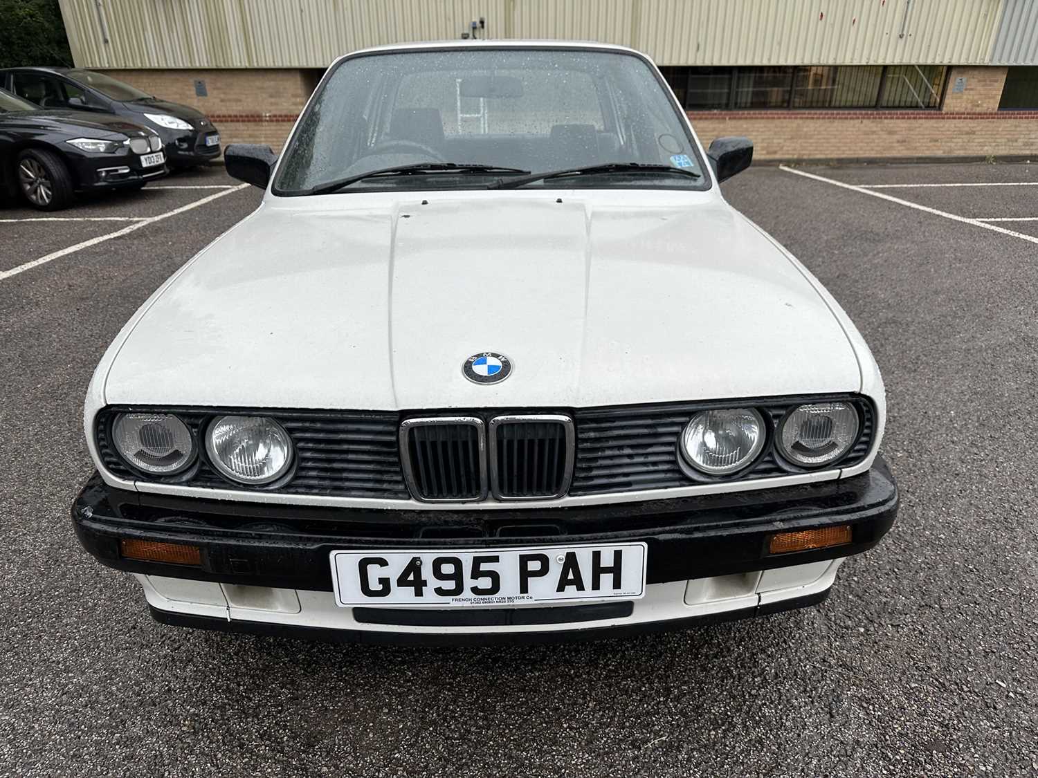 Lot 2 - 1990 BMW 318i, 4 door saloon, 1796cc engine, reg. no. G495 PAH, finished in white with a velour interior, MOT expired 29th October 2020. Supplied with V5, keys and book pack. (Subject to 12% buyers...