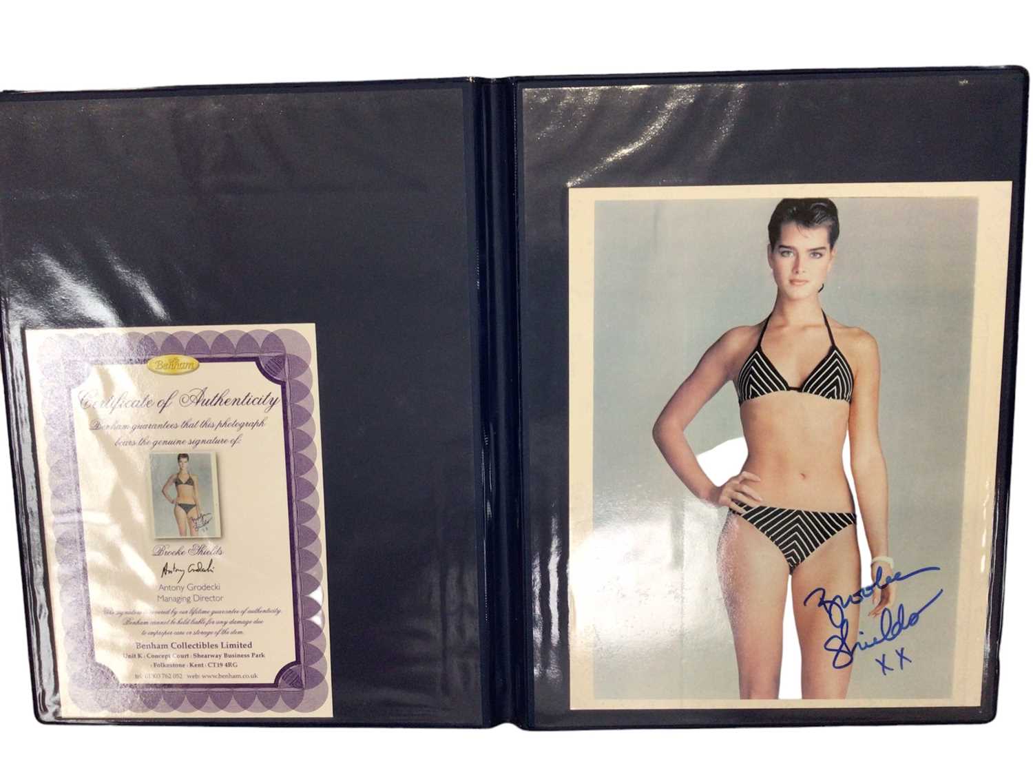 Lot 1497 - Five autographed photographs in folders with certificates of authenticity from Bentham Collectibles Ltd. Includes Mia Wasikowska, Brooke Shields, Madeline Smith, Ingrid Pitt, Hayley Mills and one o...