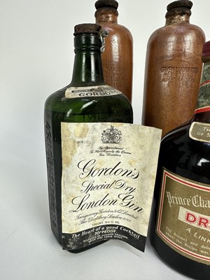 Lot 21 - Seven bottles, including Gordon's gin, 1950s-60s, Drambuie, Apricot Brandy and three bottles of Dutch Bols in stoneware bottles