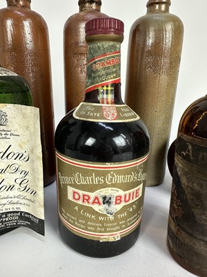 Lot 21 - Seven bottles, including Gordon's gin, 1950s-60s, Drambuie, Apricot Brandy and three bottles of Dutch Bols in stoneware bottles