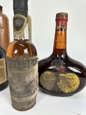 Lot 21 - Seven bottles, including Gordon's gin, 1950s-60s, Drambuie, Apricot Brandy and three bottles of Dutch Bols in stoneware bottles