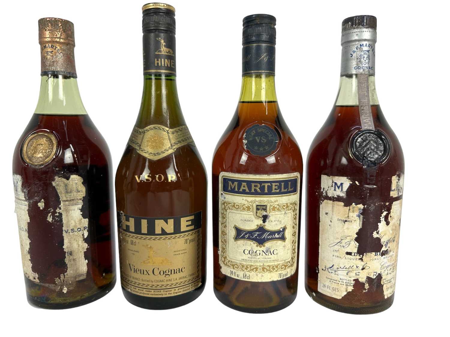 Lot 24 - Cognac - four bottles, Martell and Hine, two mostly lacking labels