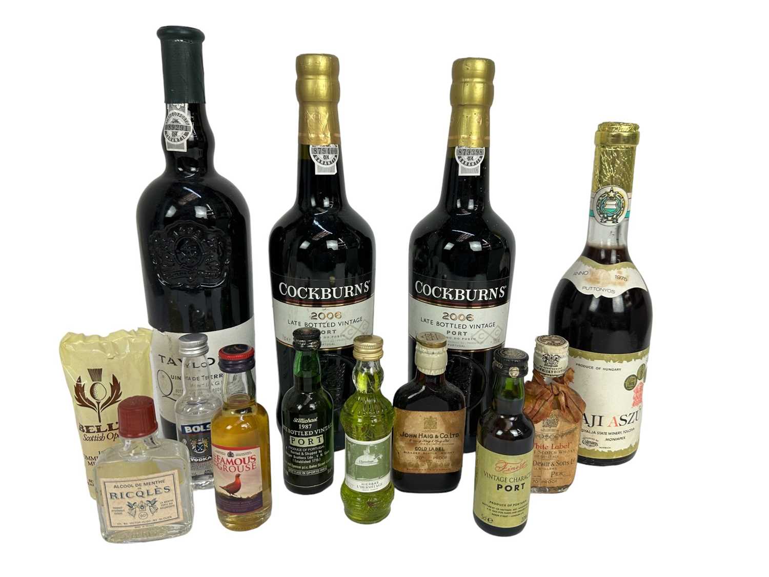Lot 42 - Mixed group, to include Cockburns 2006 (2), Taylors 1999, Tokaji Aszu 4 Puttonyos, together with nine miniatures to include John Haig, Dewar White Label and others (13)