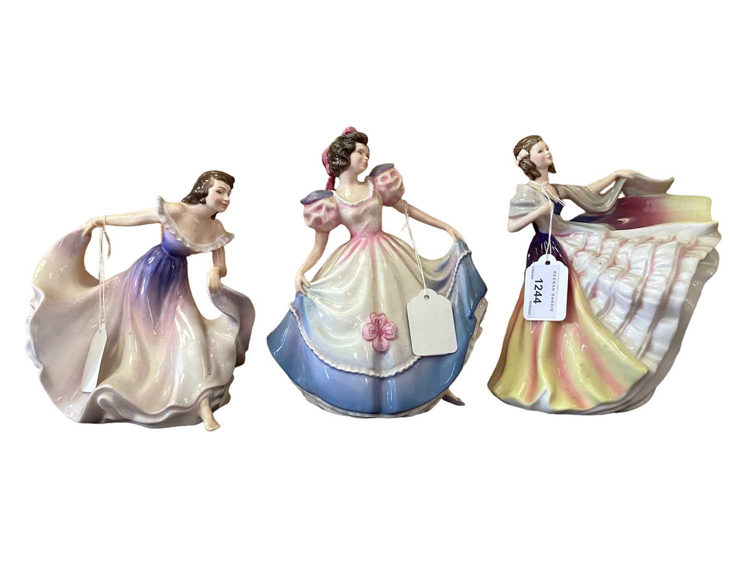 Lot 1244 - Ten Royal Doulton figures - Lauren HN3290, Elizabeth HN2946, Patricia HN4738, Autumn Breezes HN1934, Diana HN3266, Angela HN3419, Simone HN2378, Sweet Sixteen HN3648, A Gypsy Dance HN2230 and Fragr...