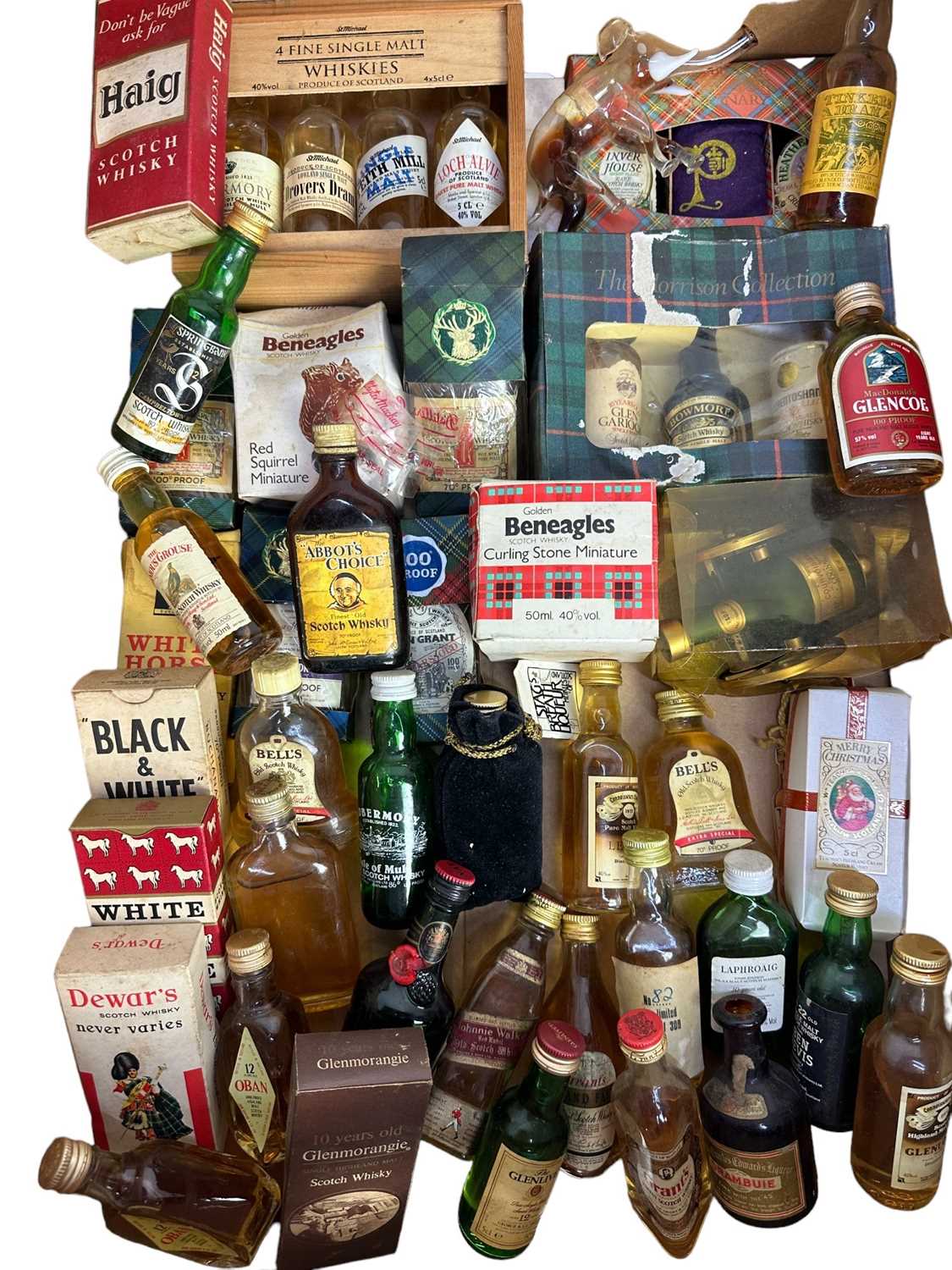 Lot 53 - Whisky - collection of miniatures to include Glenlivet, Laphroaig, Glenmorangie, Haig and many others, approximately 50 bottles