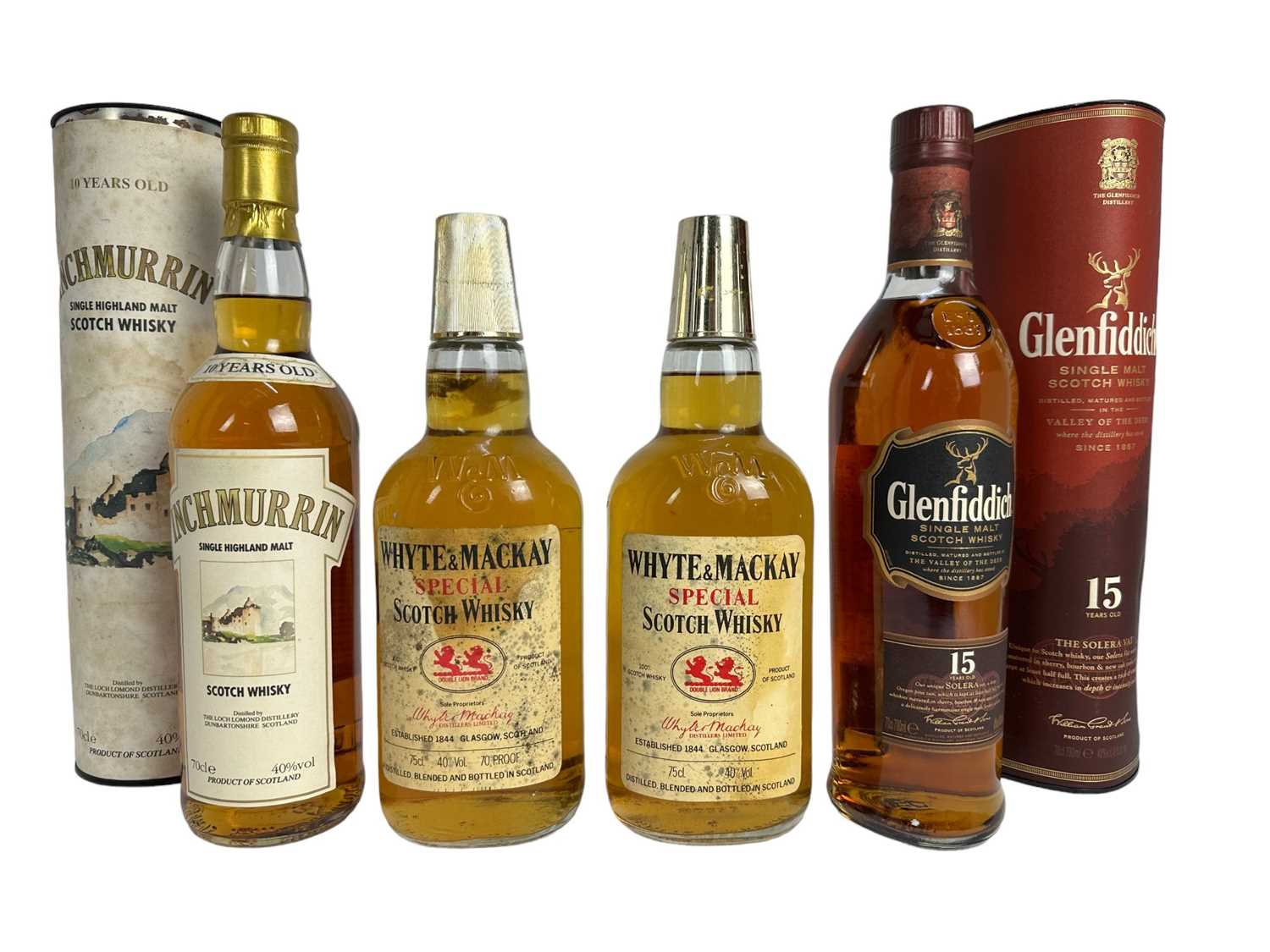 Lot 54 - Whisky - four bottles, Glenfiddich 15 years old, Inchmurrin 10 year old and two bottles of Whyte & Mackay Scotch whisky