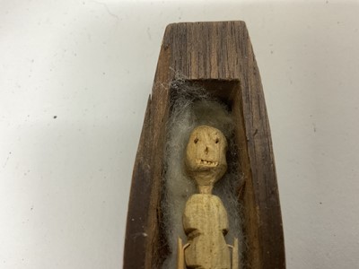 Lot 41 - Rare hand carved softwood poppet, the whittled figure of skeletal appearance, housed with a carved mahogany miniature coffin, 19th century or earlier