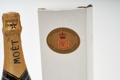 Lot 40 - Moët & Chandon bottle of Champagne with presentation label for the 1997 Golden Wedding Annivery of H.M.Queen Elizabeth II and H.R.H. The Duke of Edinburgh in original box