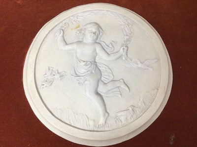 Lot 980 - Victorian parian ware relief plaque together with a set of four plaster roundels