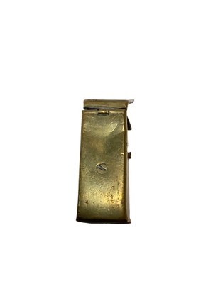 Lot 5 - Victorian brass novelty Vesta case in the form of an outside privy with opening door revealing seated figure 50mm high and another in the form of a brass violin case (2)