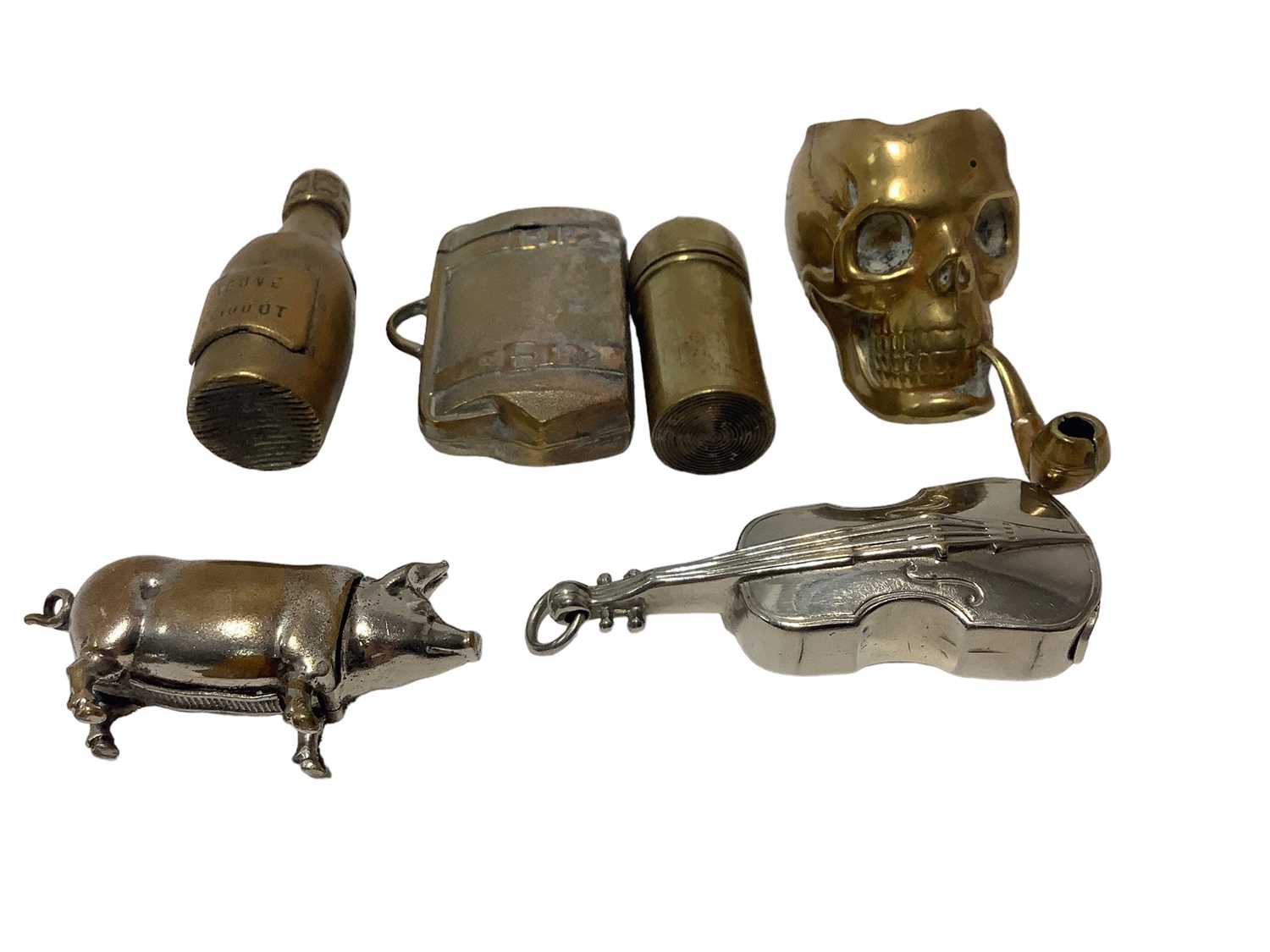 Lot 18 - Six Victorian brass and plated novelty Vesta cases including skull, violin and pig (6)