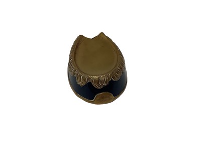 Lot 34 - Three Victorian novelty Vesta cases in the form of horse hooves comprising two brass and a Vulcanite example (3)