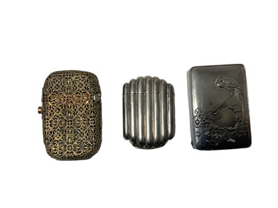 Lot 85 - Collection of Victorian and later Vesta boxes and match box holders including combination silver Vesta and Soverign case ( damaged) Royal, novelty and advertising ( 40 plus)