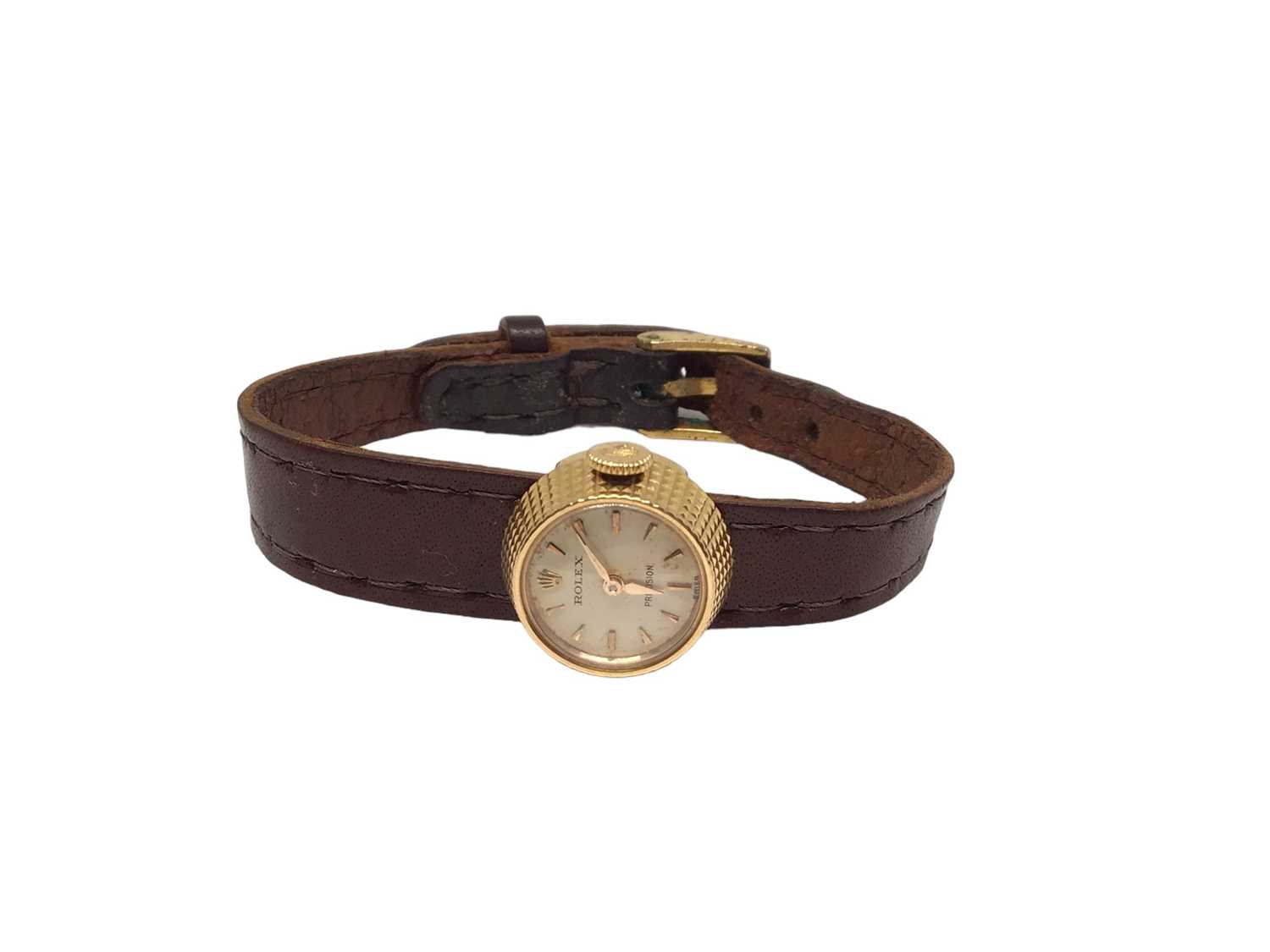 Lot 92 - 1950s Rolex Precision 18ct gold cased ladies wristwatch on integral brown leather strap