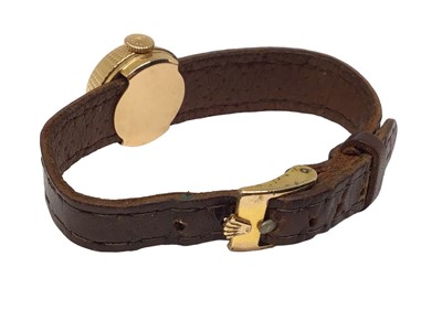 Lot 92 - 1950s Rolex Precision 18ct gold cased ladies wristwatch on integral brown leather strap