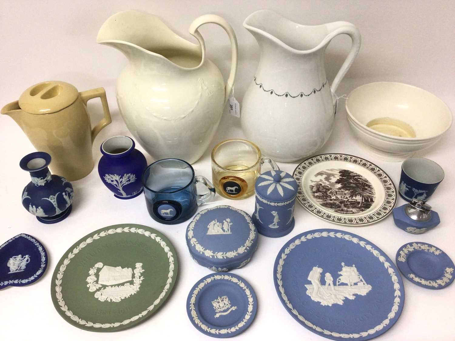 Lot 24 - Wedgwood Queensware wash jug, moulded with garlands, another wash jug, and other items