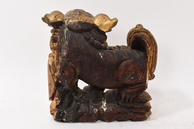 Lot 874 - Antique Chinese carved gilt Buddhist lion and pair of carved guardians