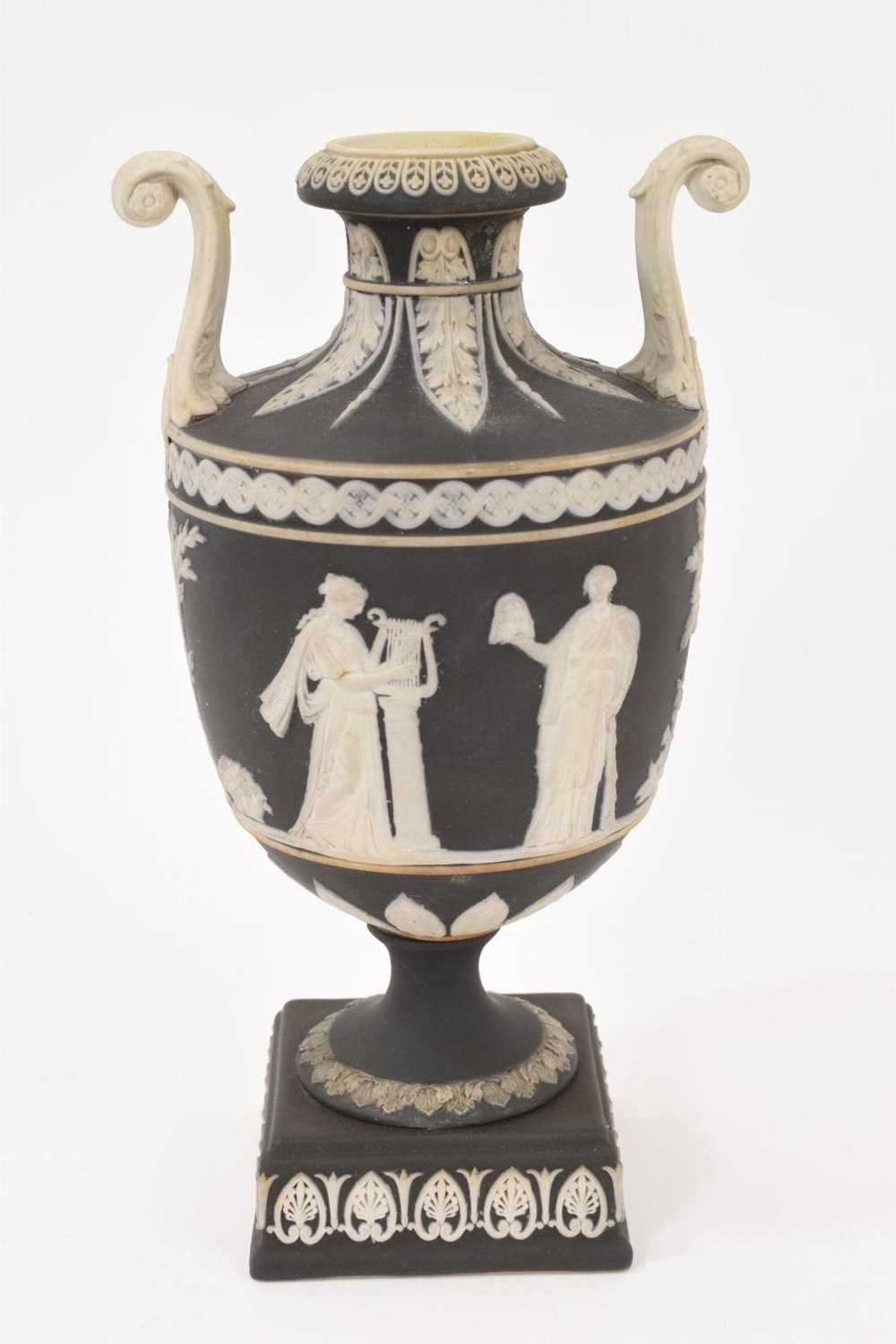 Lot 137 - Wedgwood black jasper dip two handled vase