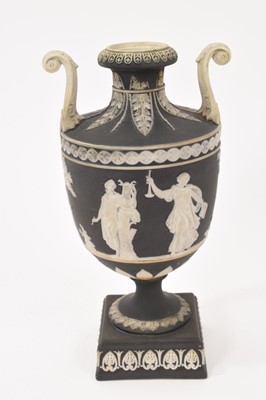 Lot 137 - Wedgwood black jasper dip two handled vase