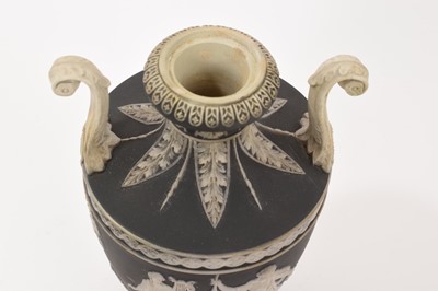 Lot 137 - Wedgwood black jasper dip two handled vase