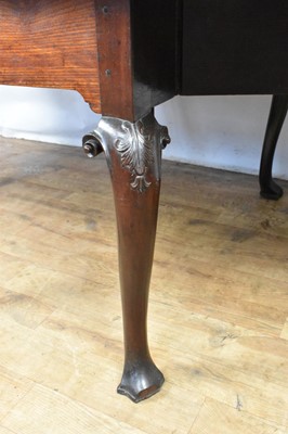 Lot 1307 - George II Cuban mahogany drop-leaf dining table
