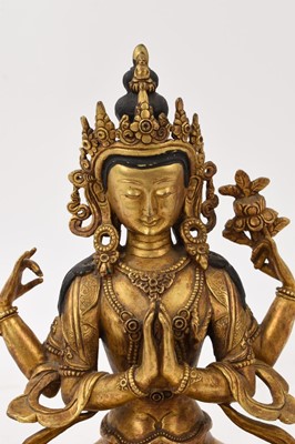 Lot 964 - Tibetan gilt bronze buddha