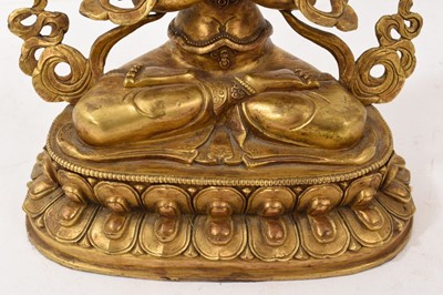 Lot 964 - Tibetan gilt bronze buddha