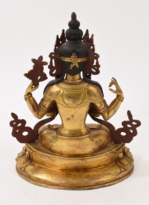 Lot 964 - Tibetan gilt bronze buddha