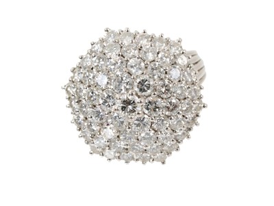 Lot 578 - Diamond cluster ring with a hexagonal tiered cluster of brilliant cut diamonds estimated to weigh to weigh approximately 3.8cts in total, in 18ct white gold setting, ring size M.