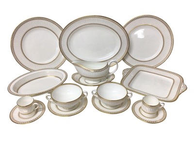 Lot 204 - Wedgwood Colonnade pattern six-eight place service for dinner and coffee, W4339 with gilded decoration, approximately 70 pieces.