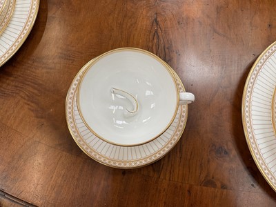 Lot 204 - Wedgwood Colonnade pattern six-eight place service for dinner and coffee, W4339 with gilded decoration, approximately 70 pieces.