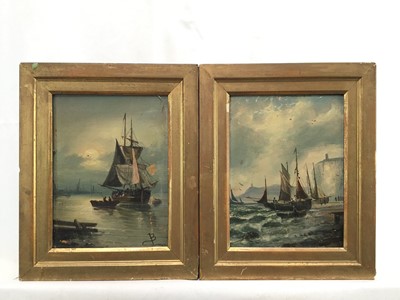 Lot 95 - English School 19th century, oils on board, fishing vessel beached by cliffs, and a sailing barge at anchor, a pair of in gilt frames, initialled J.B. Each 19 x 14cm. (2)