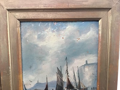 Lot 95 - English School 19th century, oils on board, fishing vessel beached by cliffs, and a sailing barge at anchor, a pair of in gilt frames, initialled J.B. Each 19 x 14cm. (2)