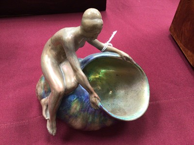 Lot 1507 - Early 20th century Zsolnay iridescent figure of Anonymous, and another. girl with shell