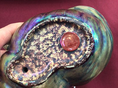 Lot 1507 - Early 20th century Zsolnay iridescent figure of Anonymous, and another. girl with shell
