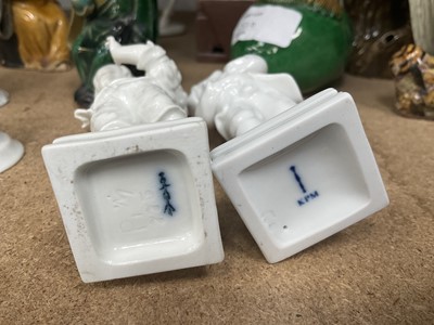 Lot 1510 - Two small Berlin porcelain figures other white glazed and similar porcelain figures