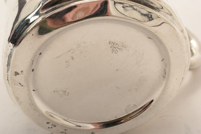 Lot 96 - Tiffany rattle and a christening mug