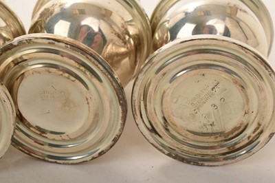 Lot 16 - Set of four contemporary American Sterling silver casters of baluster form