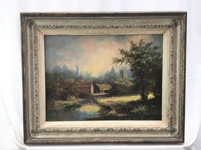 Lot 107 - Noel Ripley (born 1944), oil on board, rural river landscape with a farm in the foreground a church beyond, signed, in gilt frame. 29 x 39cm.