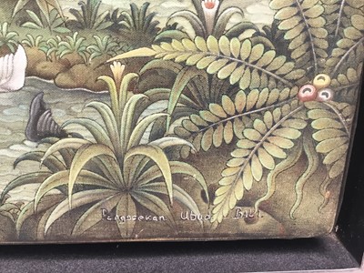 Lot 36 - Balinese school, painting on cloth - extensive landscape, signed and inscribed Ubud, Bali, 60 x 83cm, framed